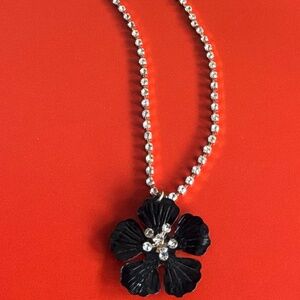 Gold toned with black flower necklace